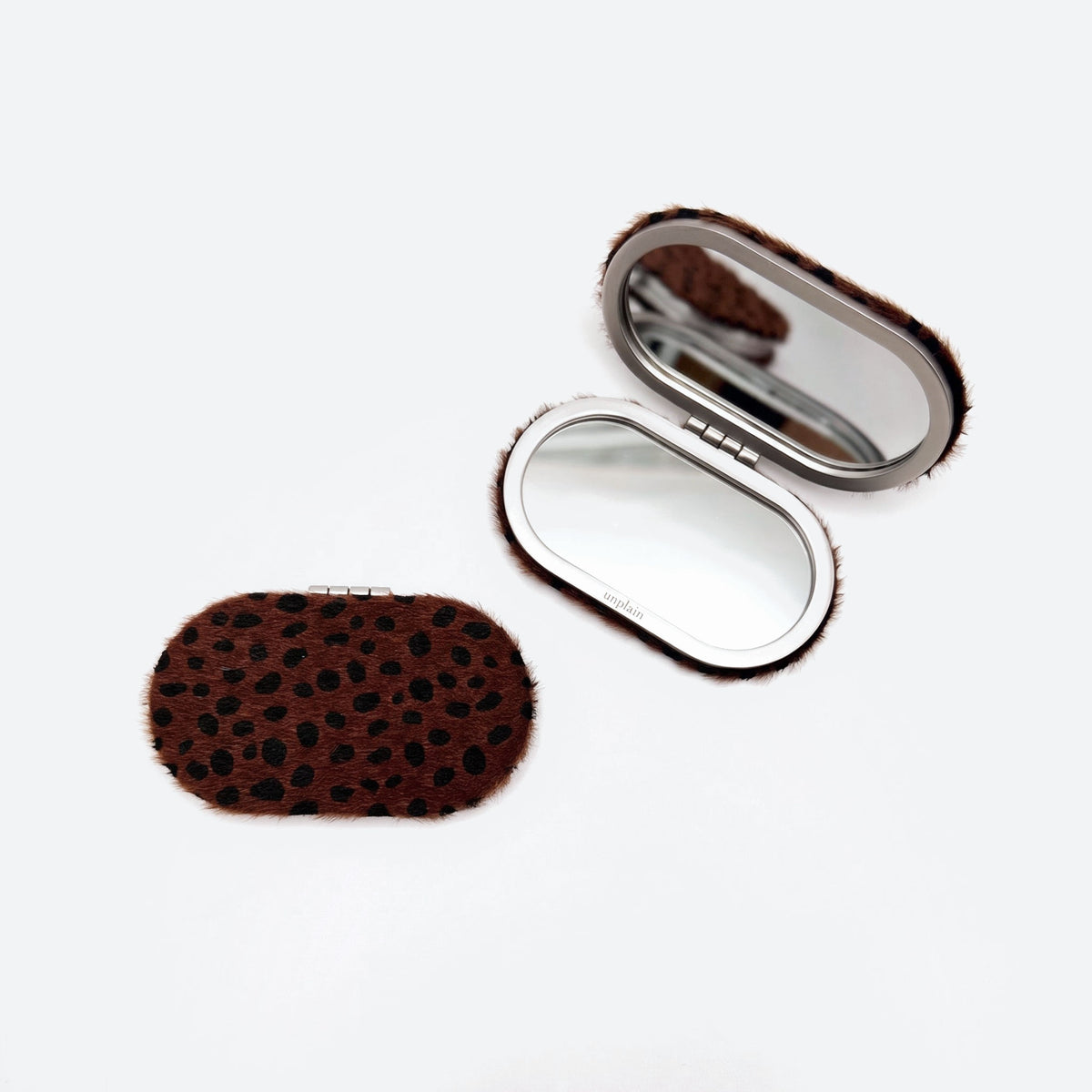Compact mirror open and closed