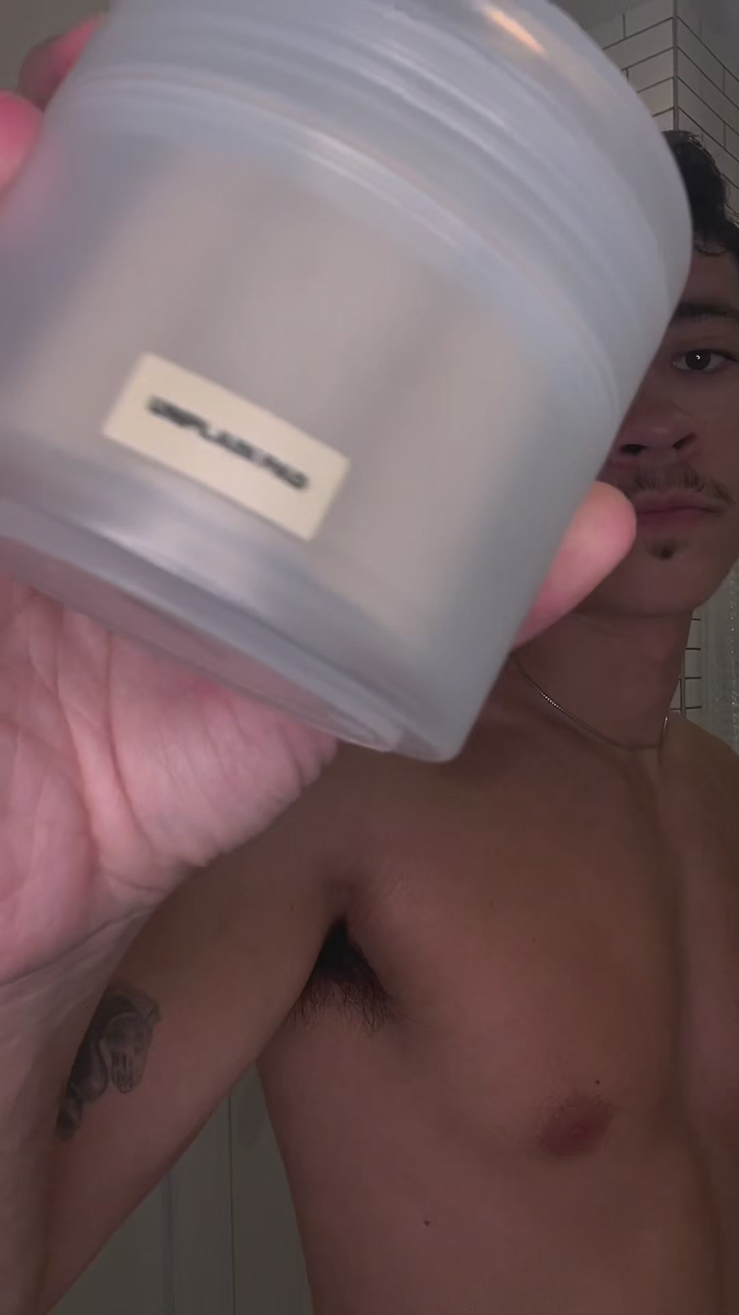 Male influencer using Unplain Oil and Unplain Pad to get ready